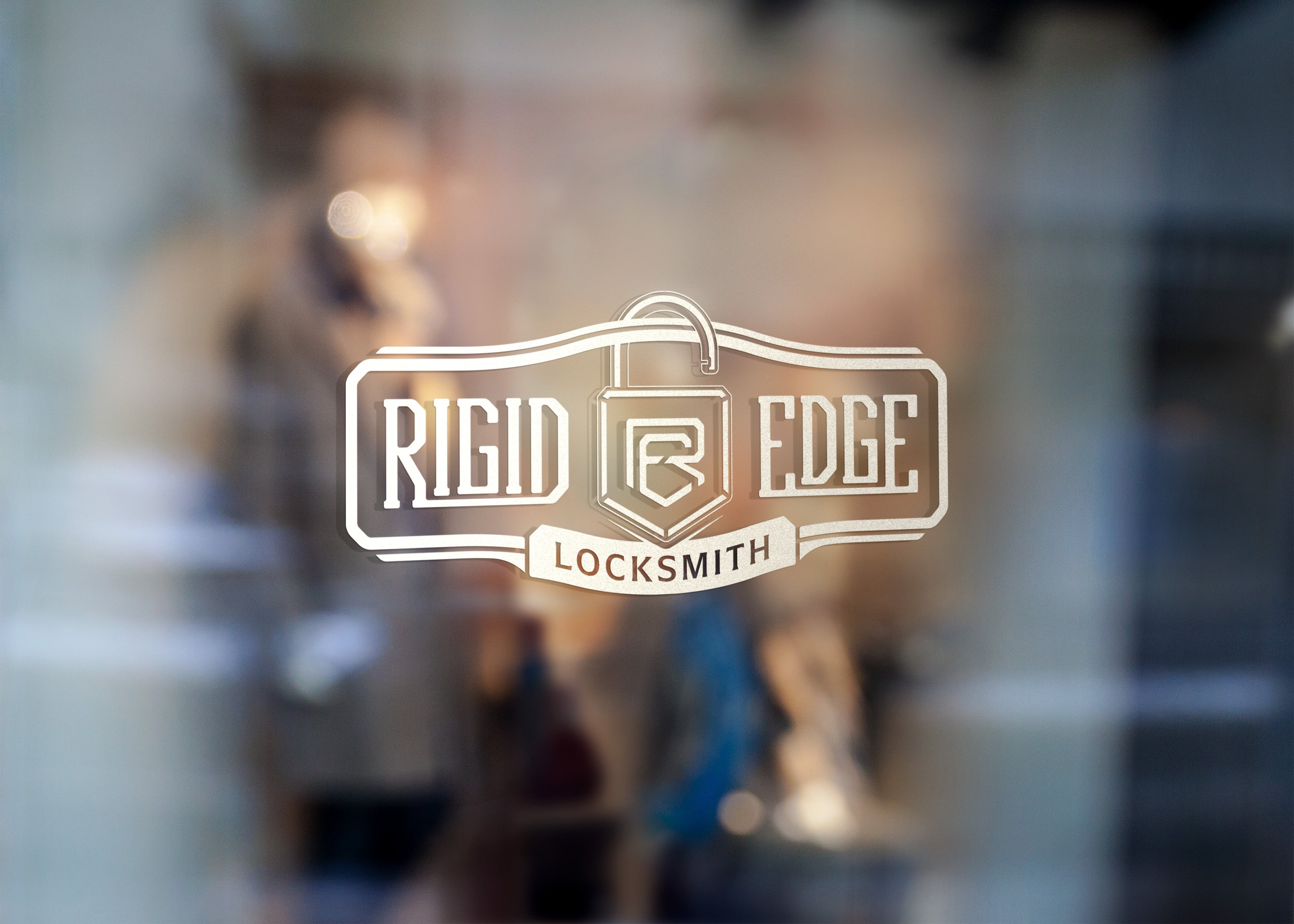 Custom window decal for Rigid Edge Locksmith, professionally designed and installed by Rogue Lab in Winnipeg.
